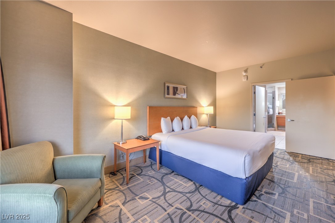 211 East Flamingo Road, Unit 1402 Las Vegas, NV 89169 - Photo 20 of 43 Bedroom featuring ensuite bathroom