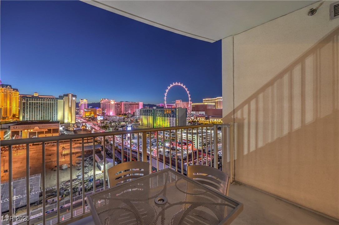 211 East Flamingo Road, Unit 1402 Las Vegas, NV 89169 - Photo 27 of 43 Balcony at night with a view of city lights