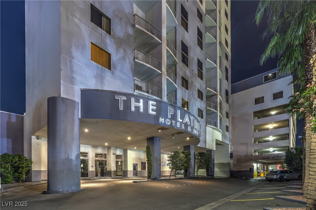 211 East Flamingo Road, Unit 1402 Las Vegas, NV 89169 - Photo 38 of 43 Property at night with a view of apartment building / complex