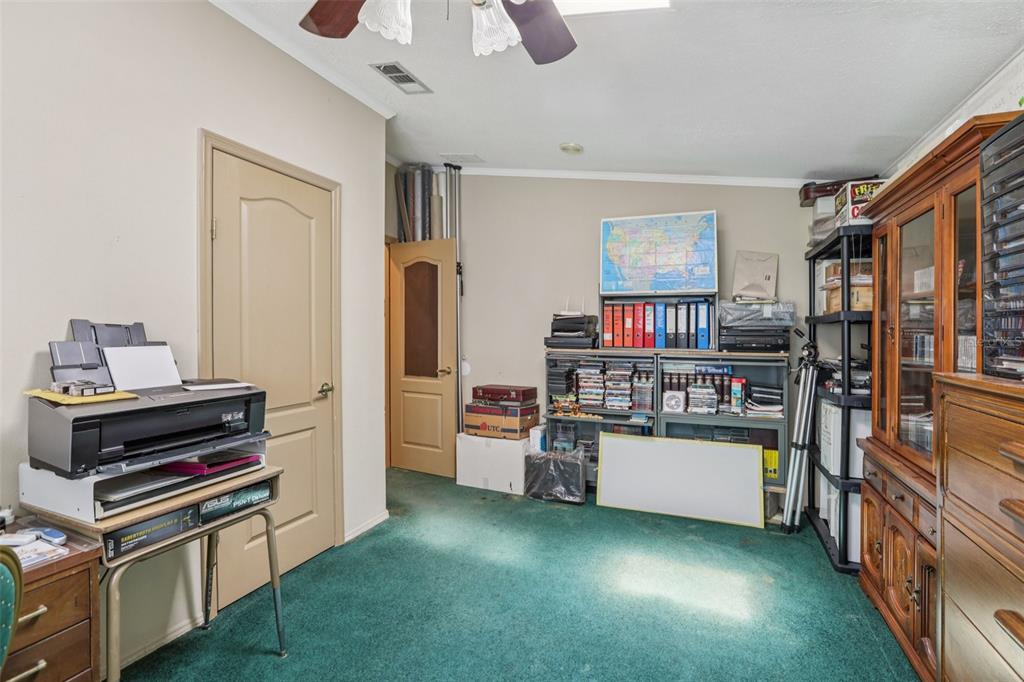 29235 Bayhead Road Dade City, FL 33523 - Photo 24 of 71 a room with furniture and storage