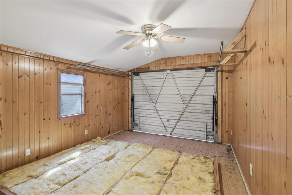 29235 Bayhead Road Dade City, FL 33523 - Photo 28 of 71 wooden floor in an empty room with a window