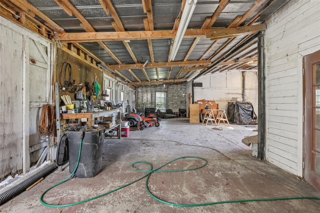 29235 Bayhead Road Dade City, FL 33523 - Photo 35 of 71 a view of a garage with wooden floor
