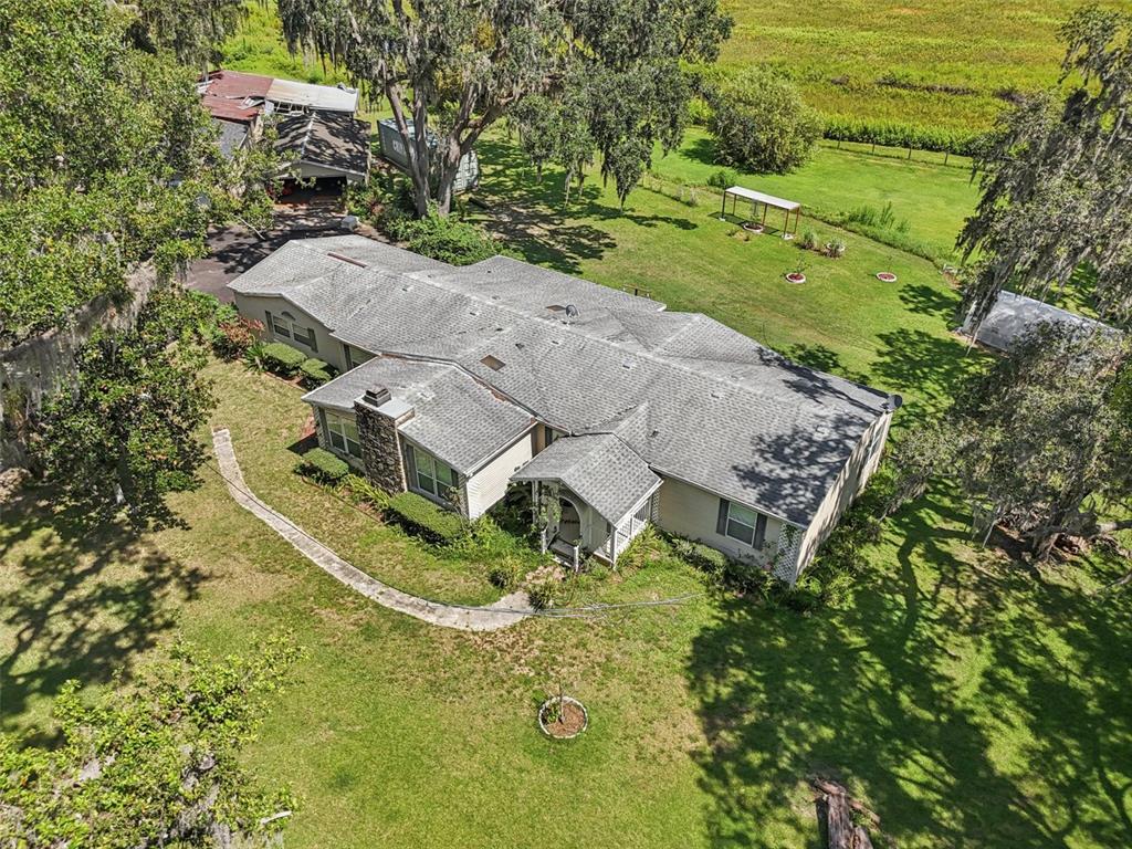 29235 Bayhead Road Dade City, FL 33523 - Photo 57 of 71 an aerial view of a house with a yard