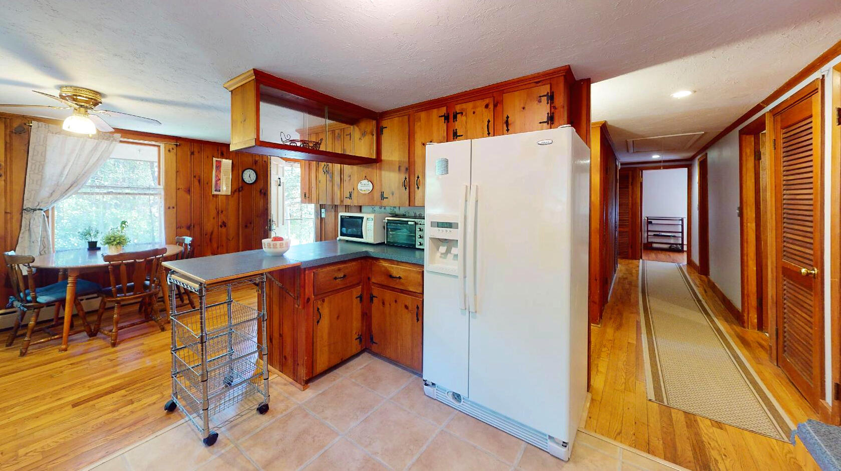 6 South Highland Road Truro, MA 02666 - Photo 12 of 27 a kitchen with stainless steel appliances a refrigerator and a refrigerator