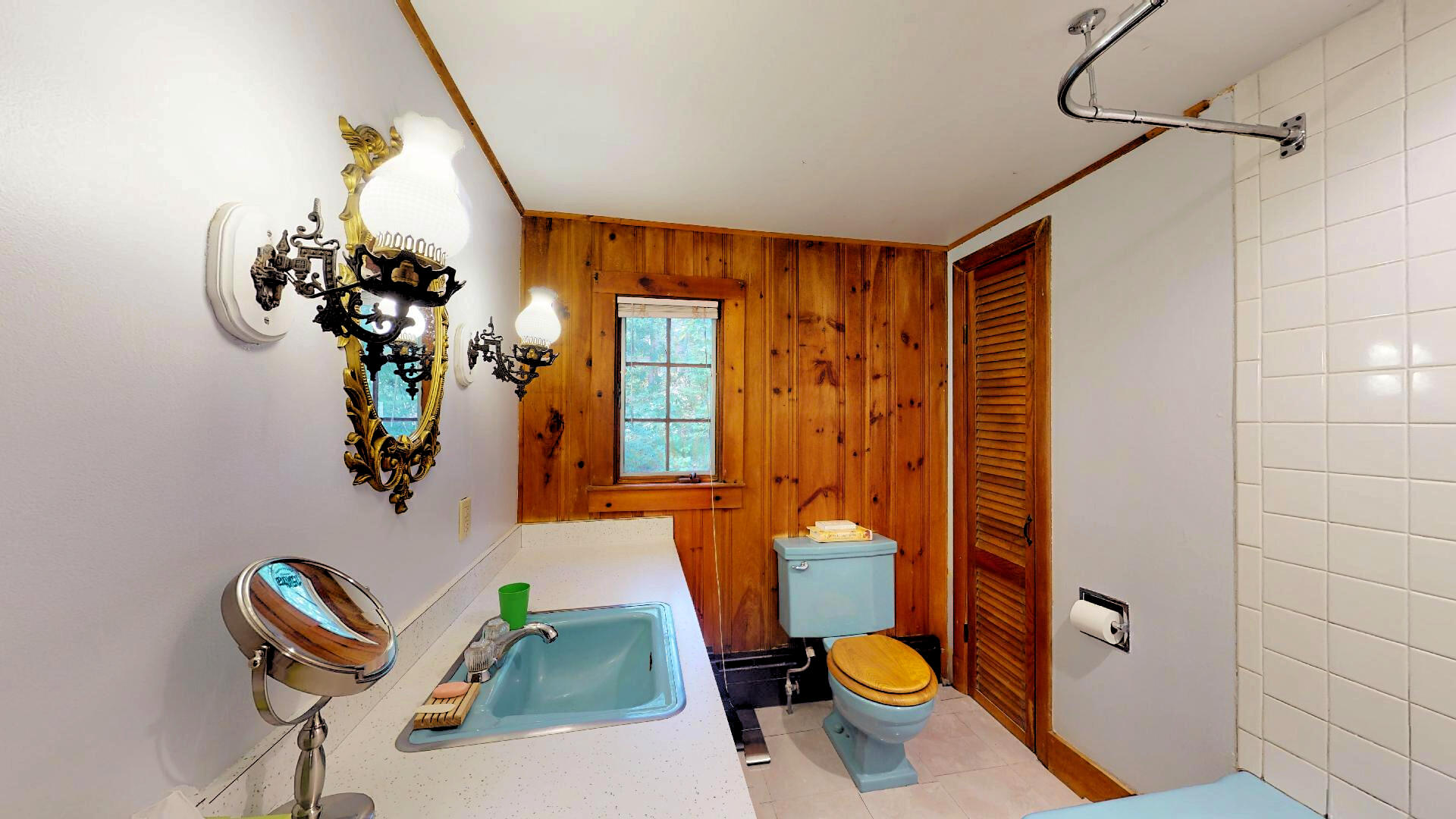 6 South Highland Road Truro, MA 02666 - Photo 14 of 27 a bathroom with a toilet sink and mirror