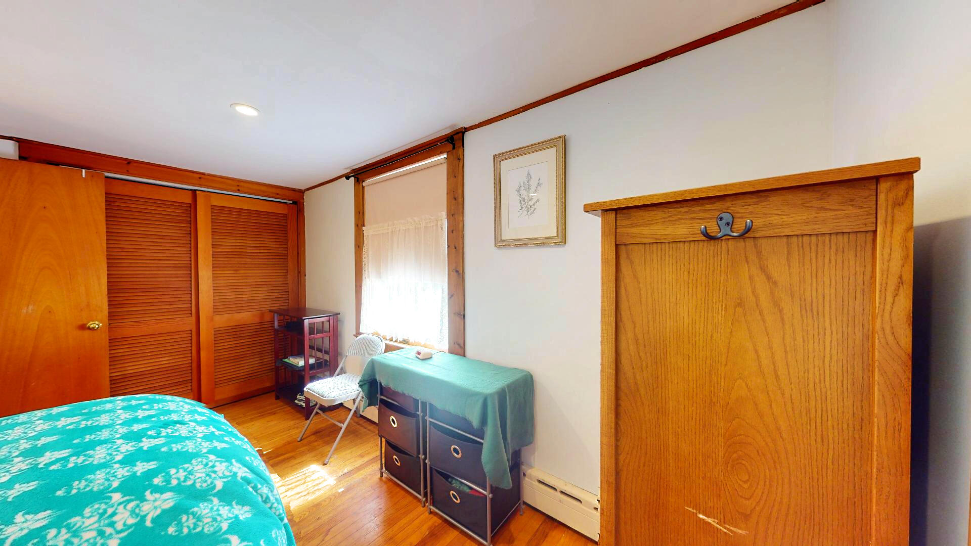 6 South Highland Road Truro, MA 02666 - Photo 19 of 27 a bedroom with a bed and furniture