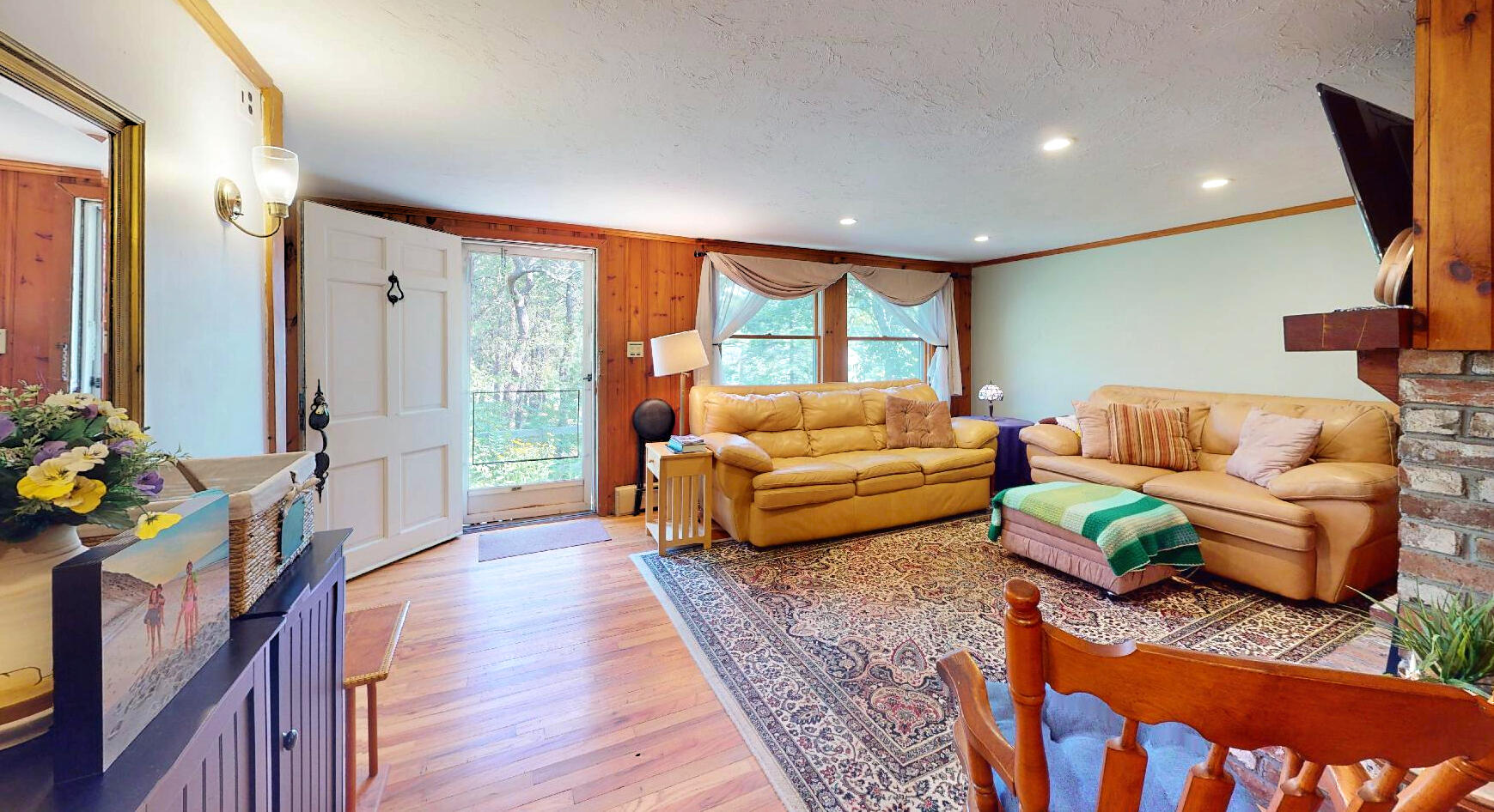 6 South Highland Road Truro, MA 02666 - Photo 7 of 27 a living room with furniture and a flat screen tv