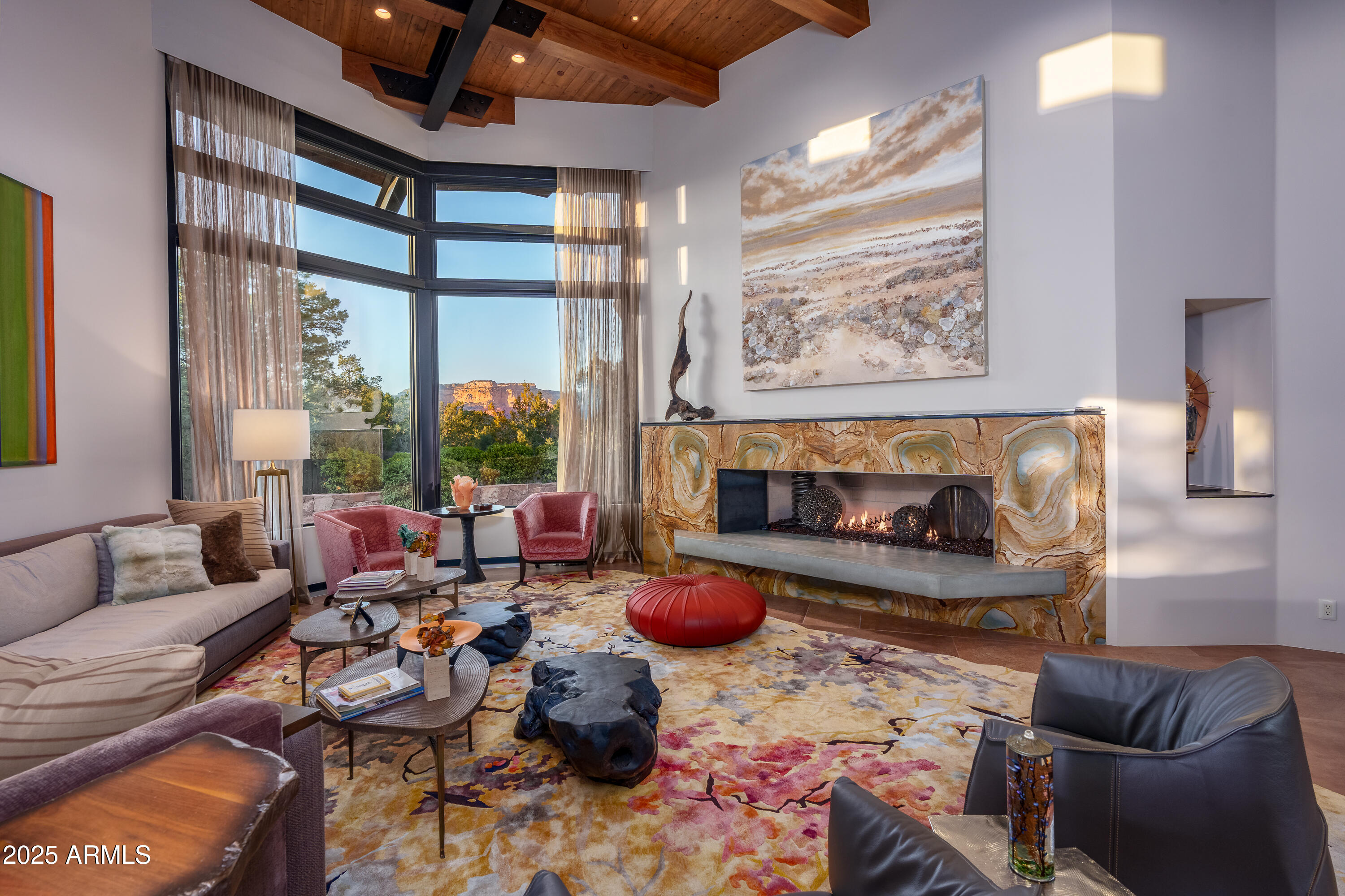 120 Paisano Road Sedona, AZ 86336 - Photo 11 of 63 a living room with furniture and a large window