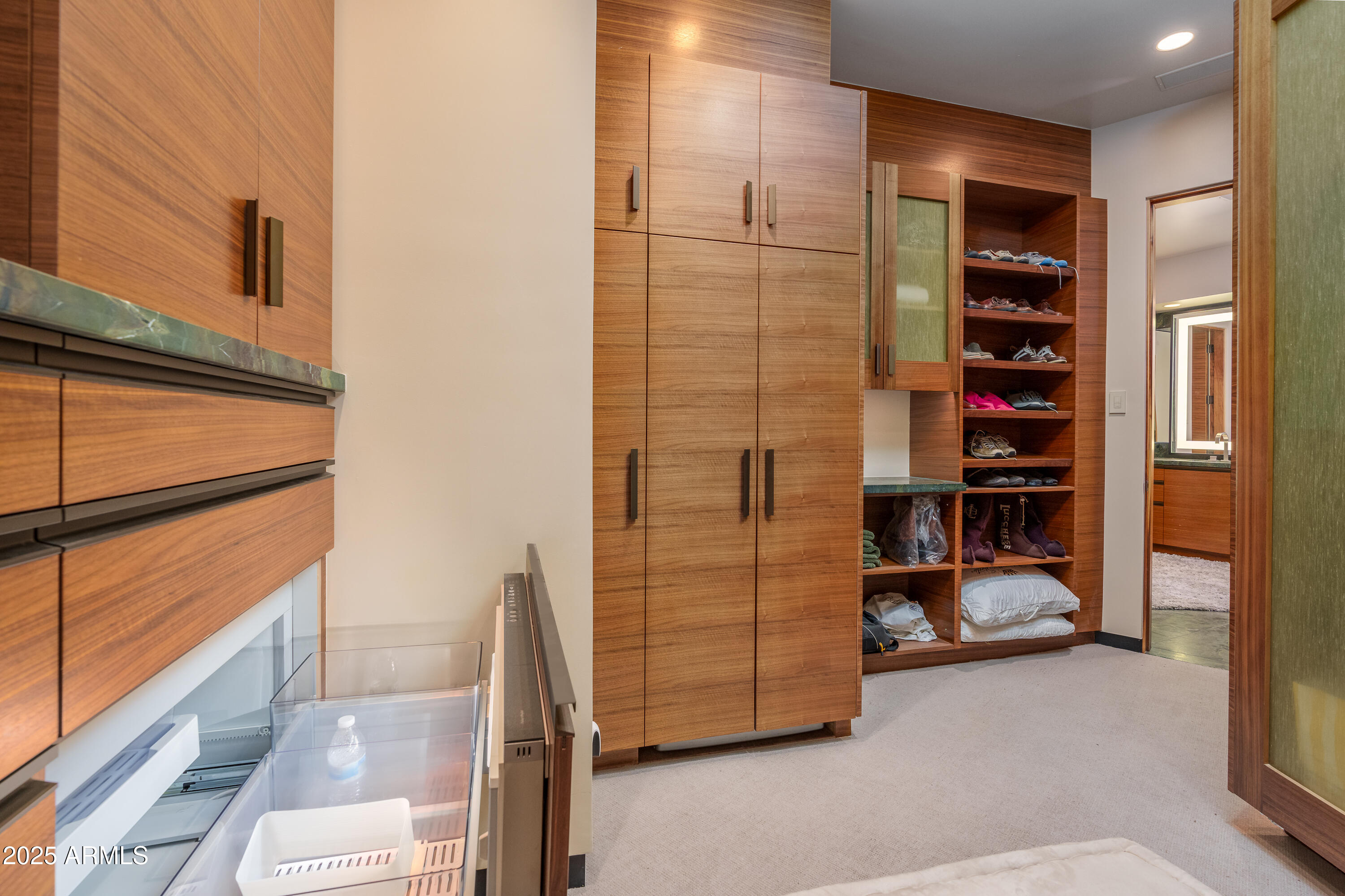 120 Paisano Road Sedona, AZ 86336 - Photo 20 of 63 a view of walk in closet with clothes