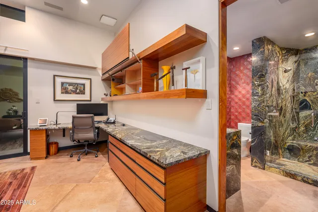 a living room with furniture a rug and a window