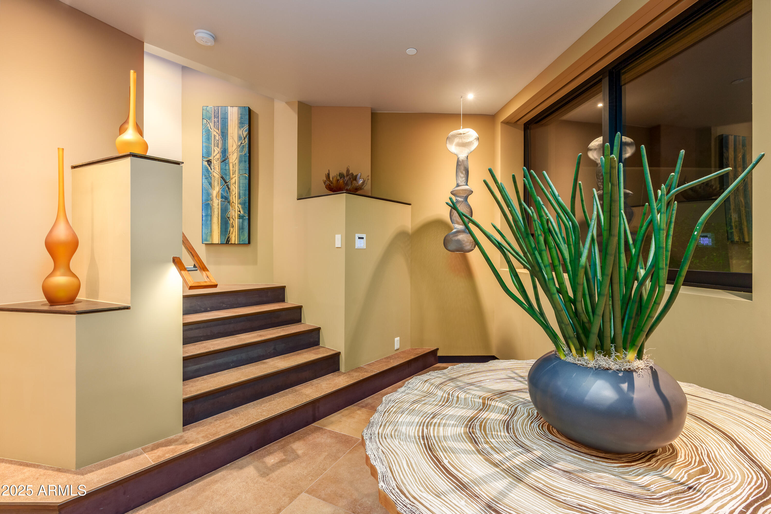 120 Paisano Road Sedona, AZ 86336 - Photo 27 of 63 a view of a potted plant in a room