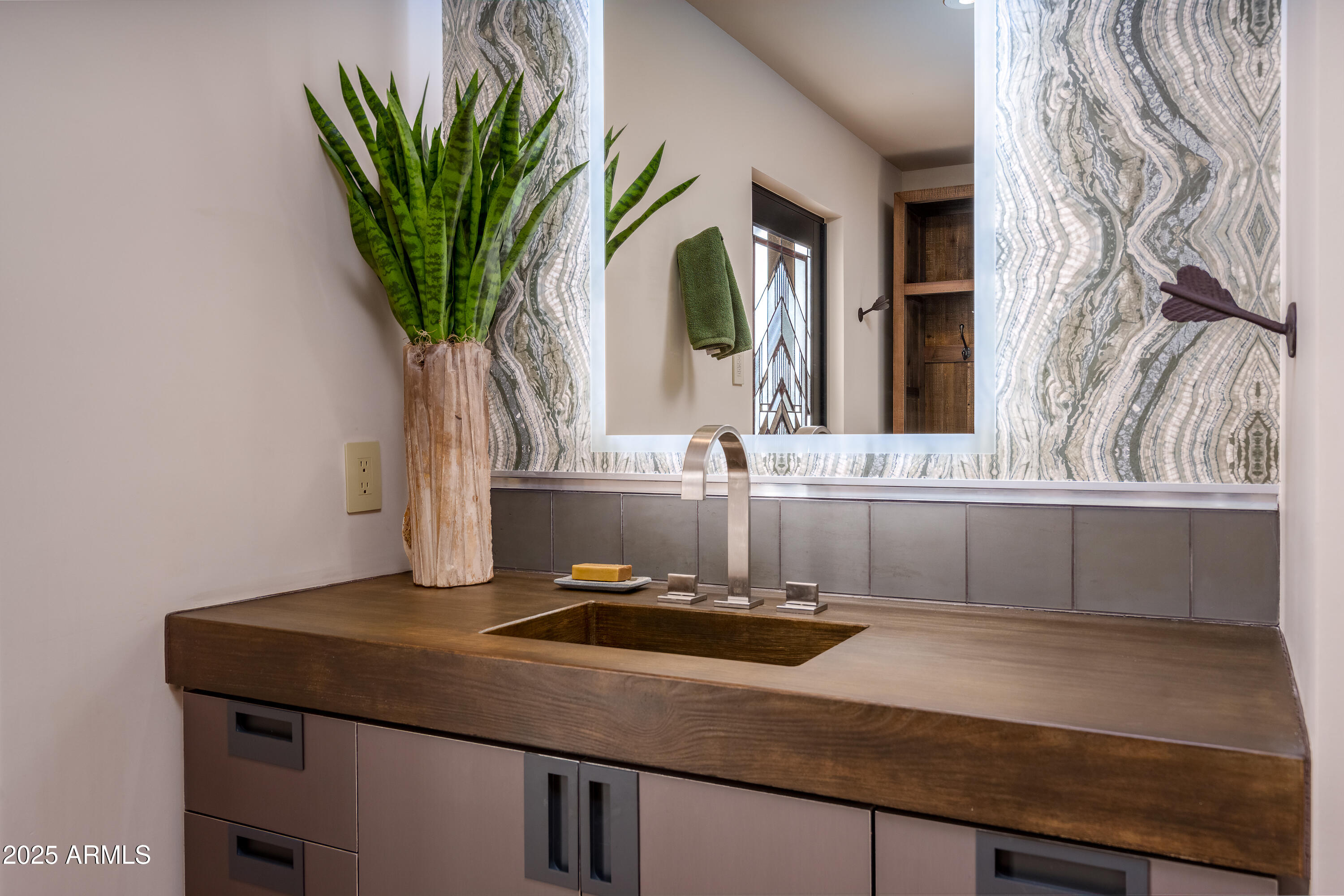 120 Paisano Road Sedona, AZ 86336 - Photo 39 of 63 a bathroom with a sink and a mirror