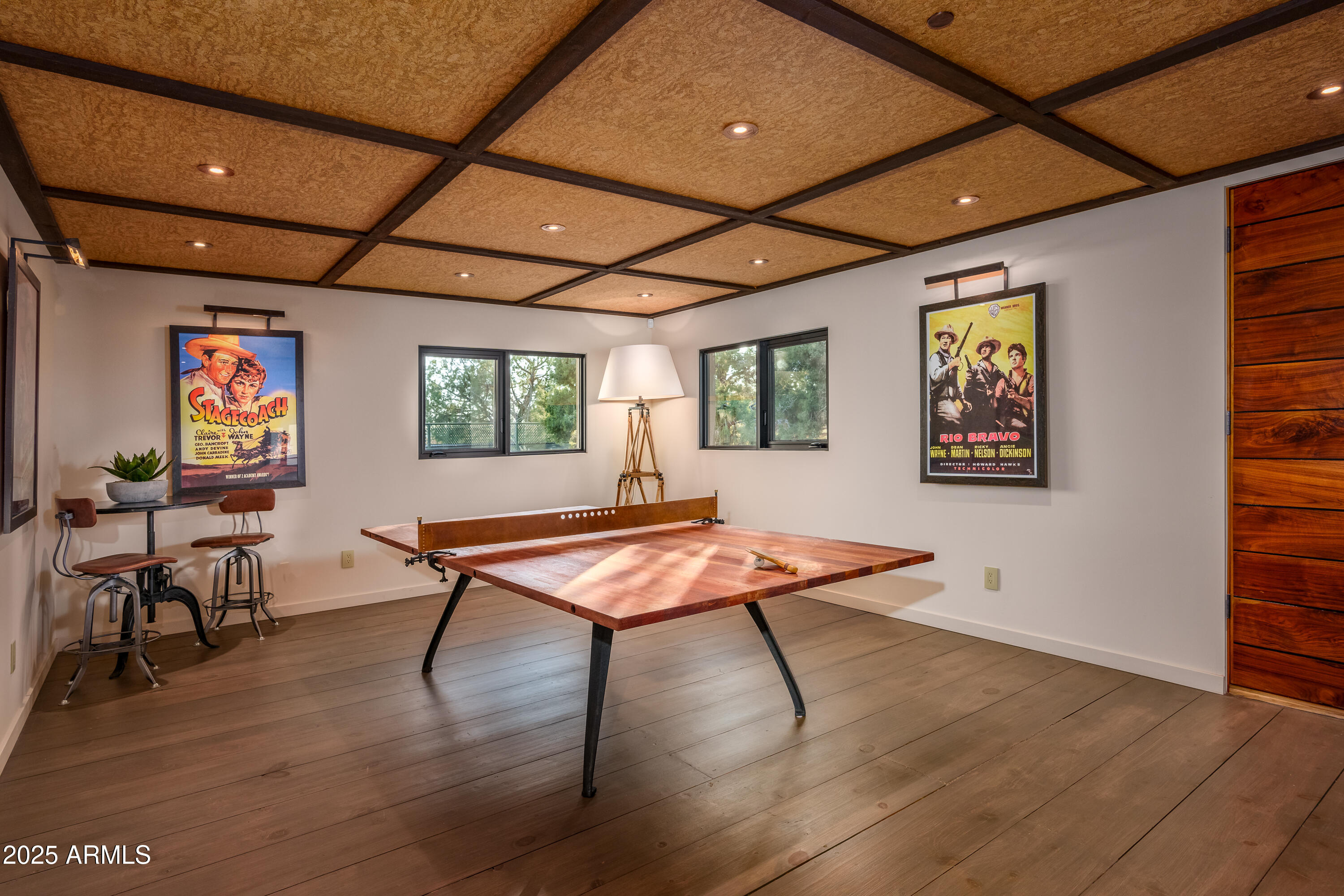 120 Paisano Road Sedona, AZ 86336 - Photo 44 of 63 a room with furniture and wooden floor