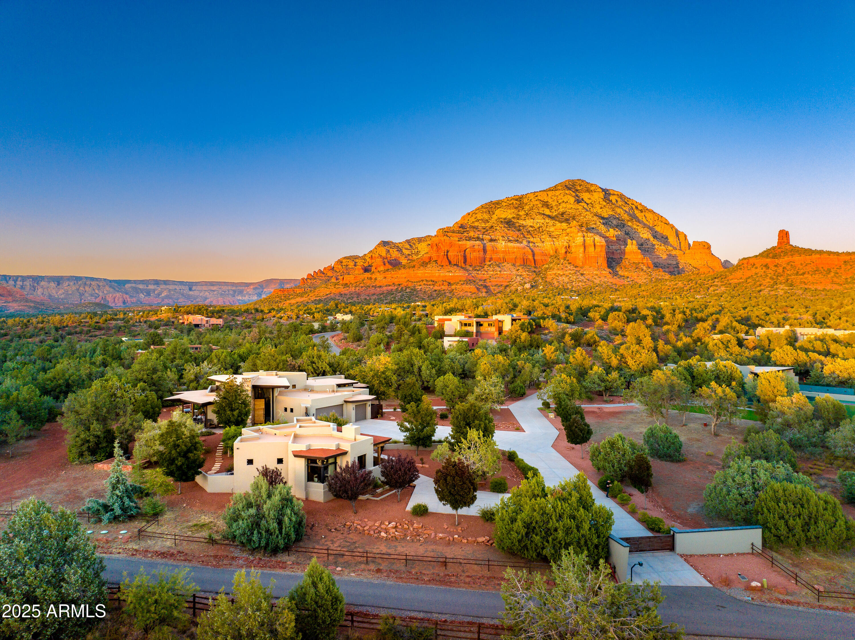 120 Paisano Road Sedona, AZ 86336 - Photo 46 of 63 an aerial view of residential houses with outdoor space and street view