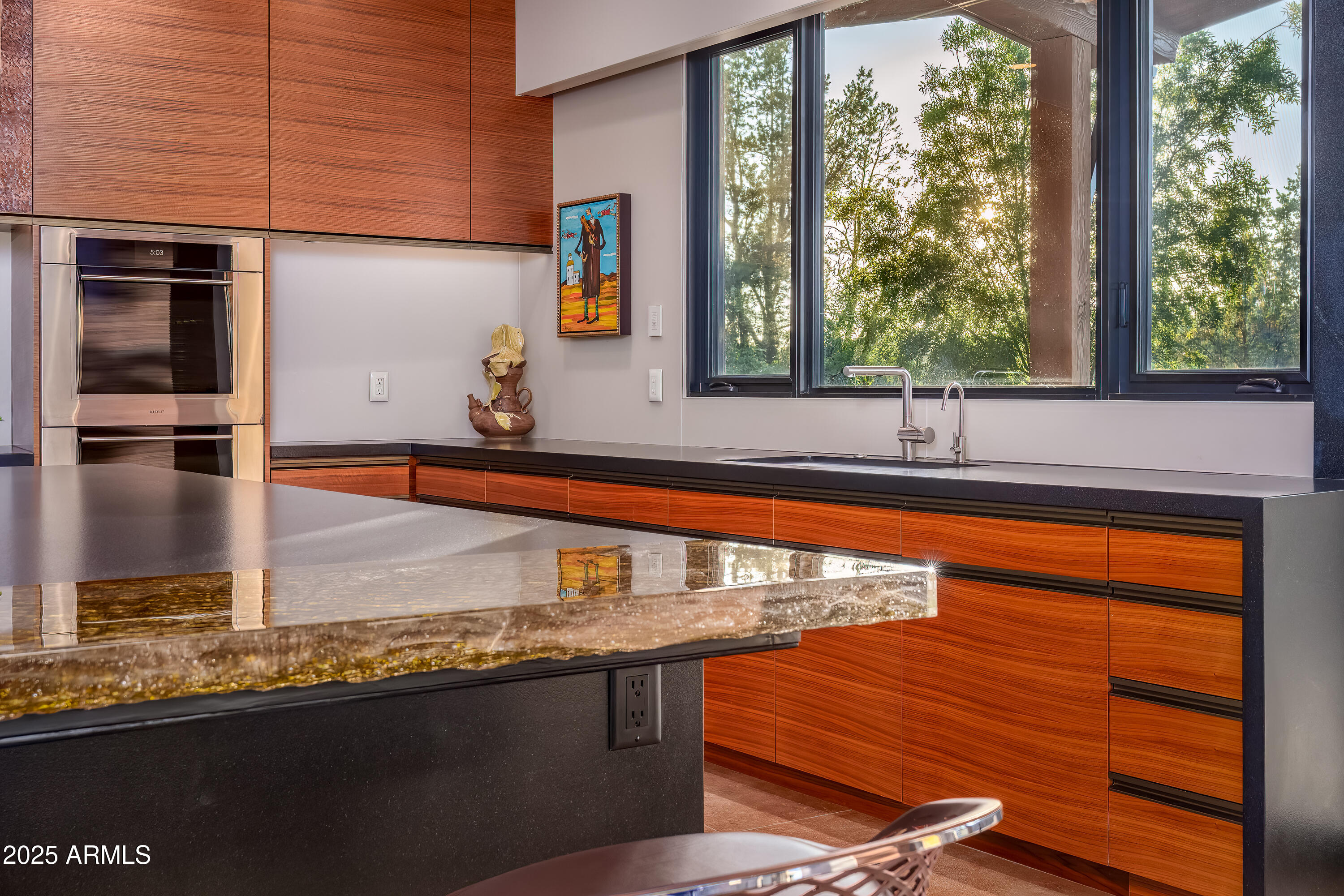 120 Paisano Road Sedona, AZ 86336 - Photo 5 of 63 a kitchen with a sink and a large window