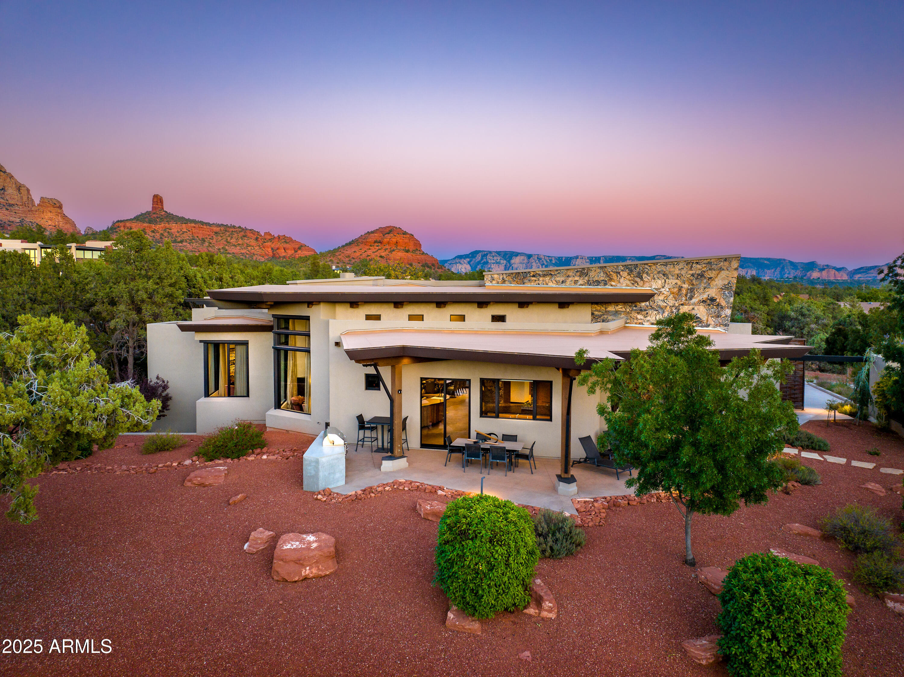 120 Paisano Road Sedona, AZ 86336 - Photo 59 of 63 a view of a house with a patio