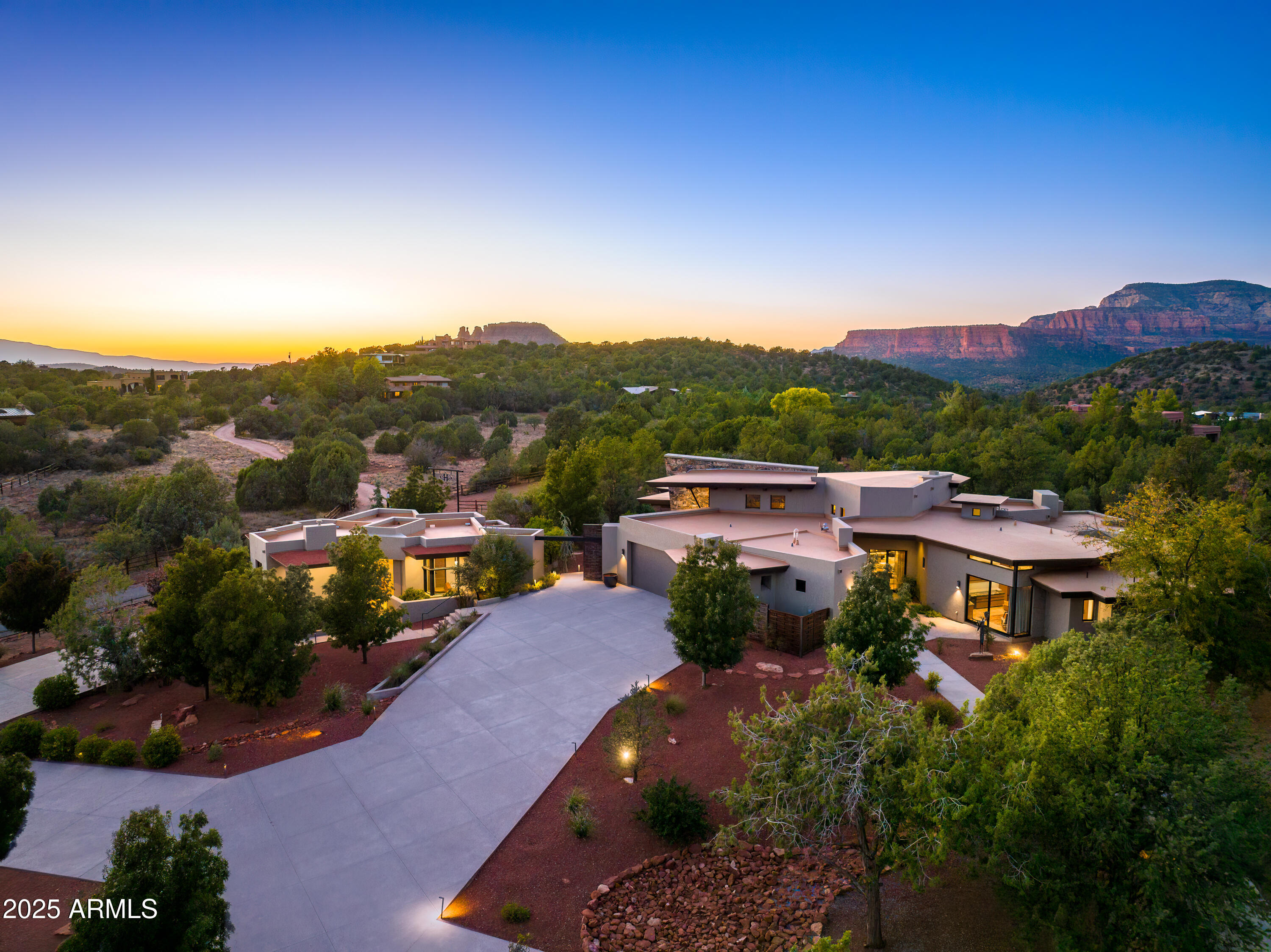 120 Paisano Road Sedona, AZ 86336 - Photo 62 of 63 a view of a houses with a yard