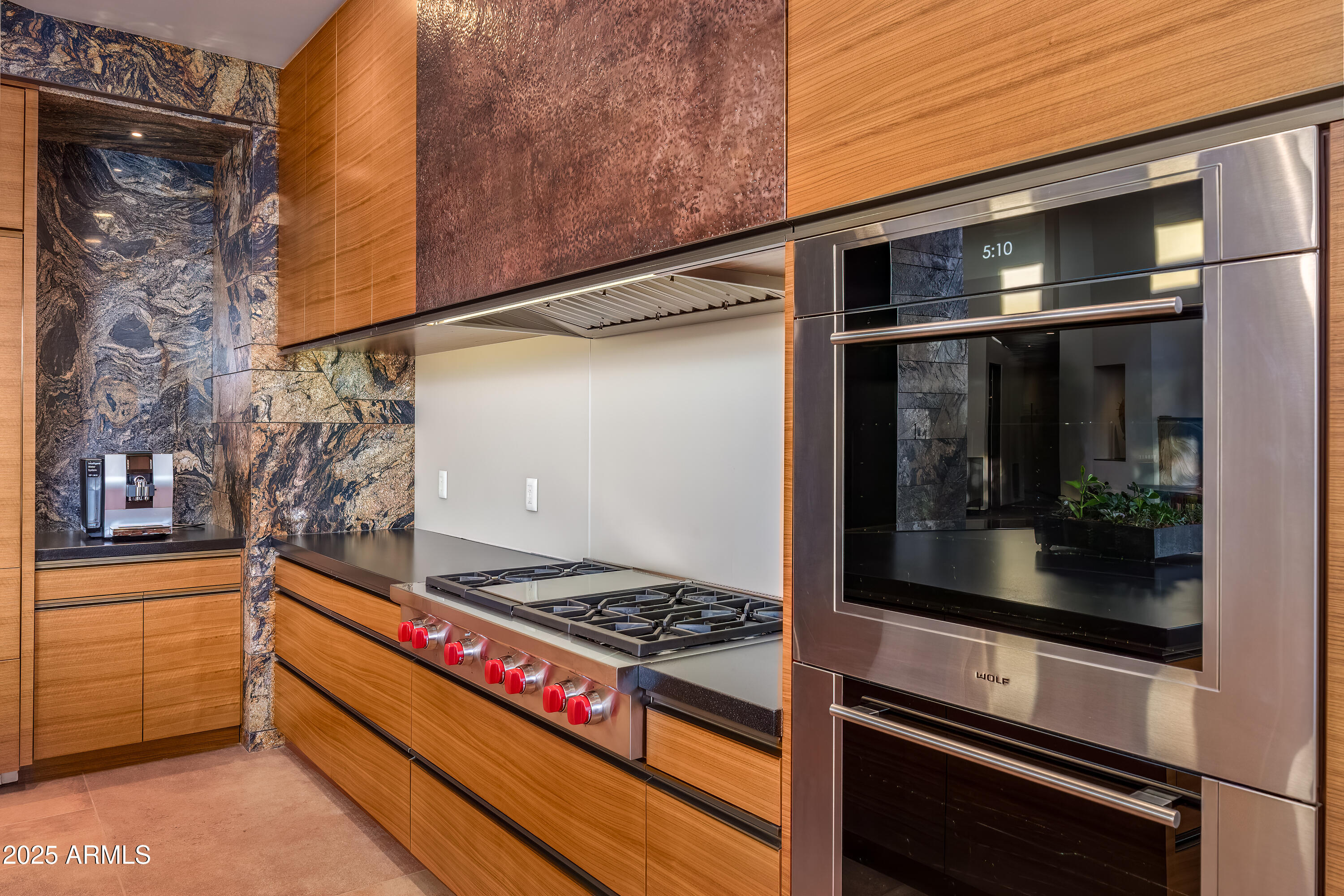 120 Paisano Road Sedona, AZ 86336 - Photo 7 of 63 a kitchen with stainless steel appliances granite countertop a stove and a refrigerator