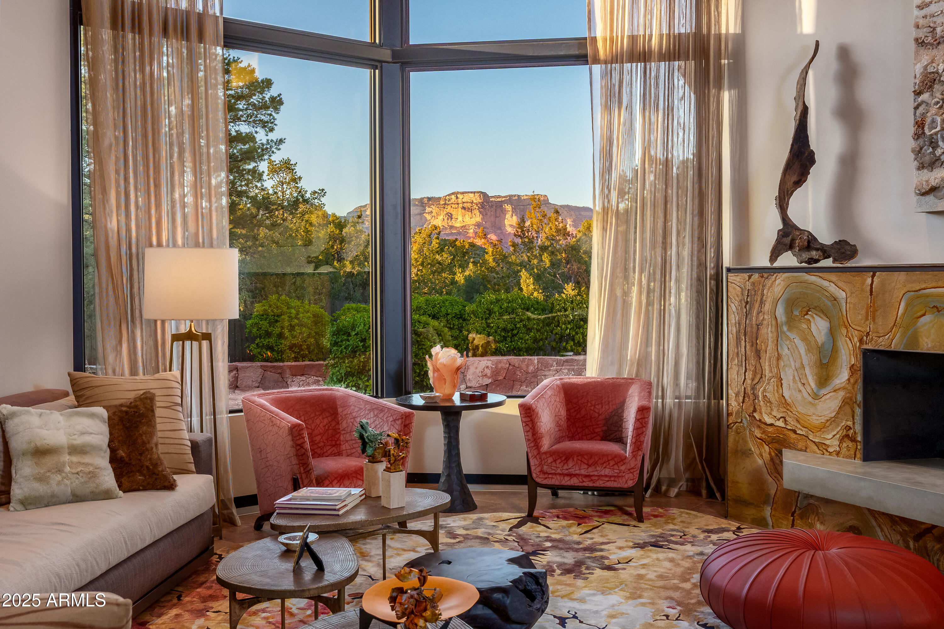 120 Paisano Road Sedona, AZ 86336 - Photo 10 of 63 a living room with furniture and a floor to ceiling window