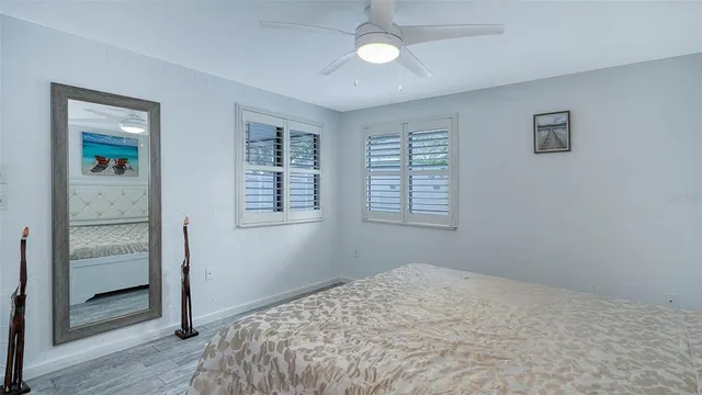 a view of a swimming pool with an outdoor space and seating area