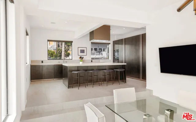 a view of entryway and hall with dining room