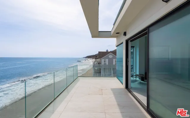 a large bathroom with a tub and shower