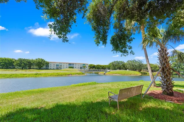 a view of a swimming pool with an ocean view