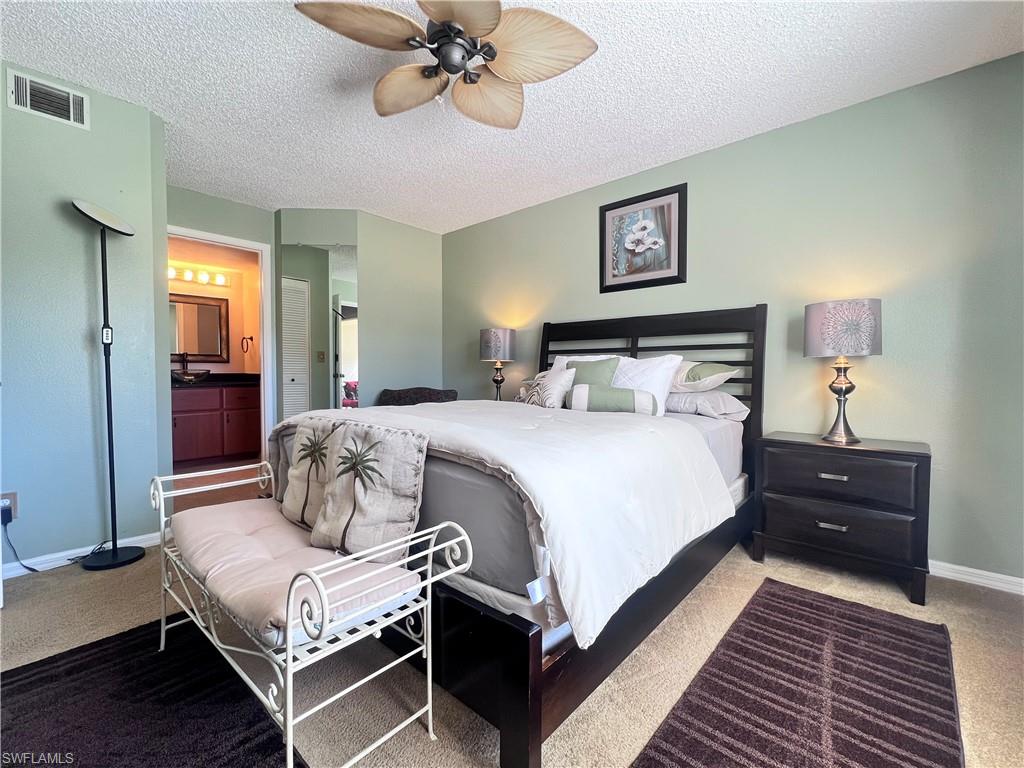 717 Landover Circle, Unit 103 Naples, FL 34104 - Photo 8 of 18 Master Bedroom