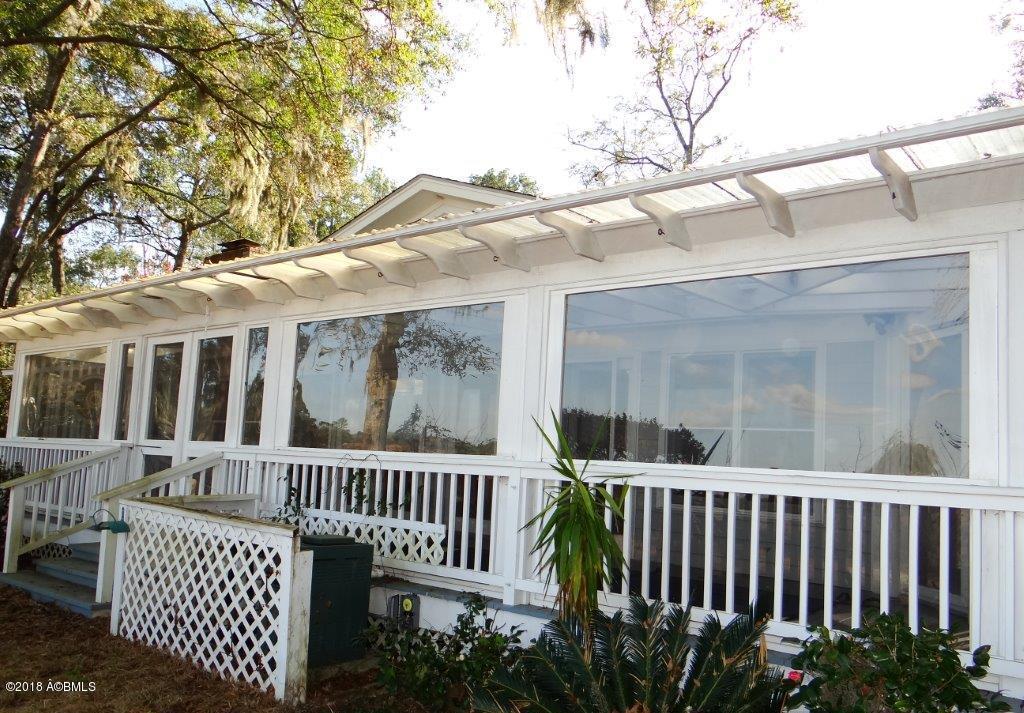 7609 Patterson Road Beaufort, SC 29906 - Photo 26 of 34 REAR ENCLOSED PORCH