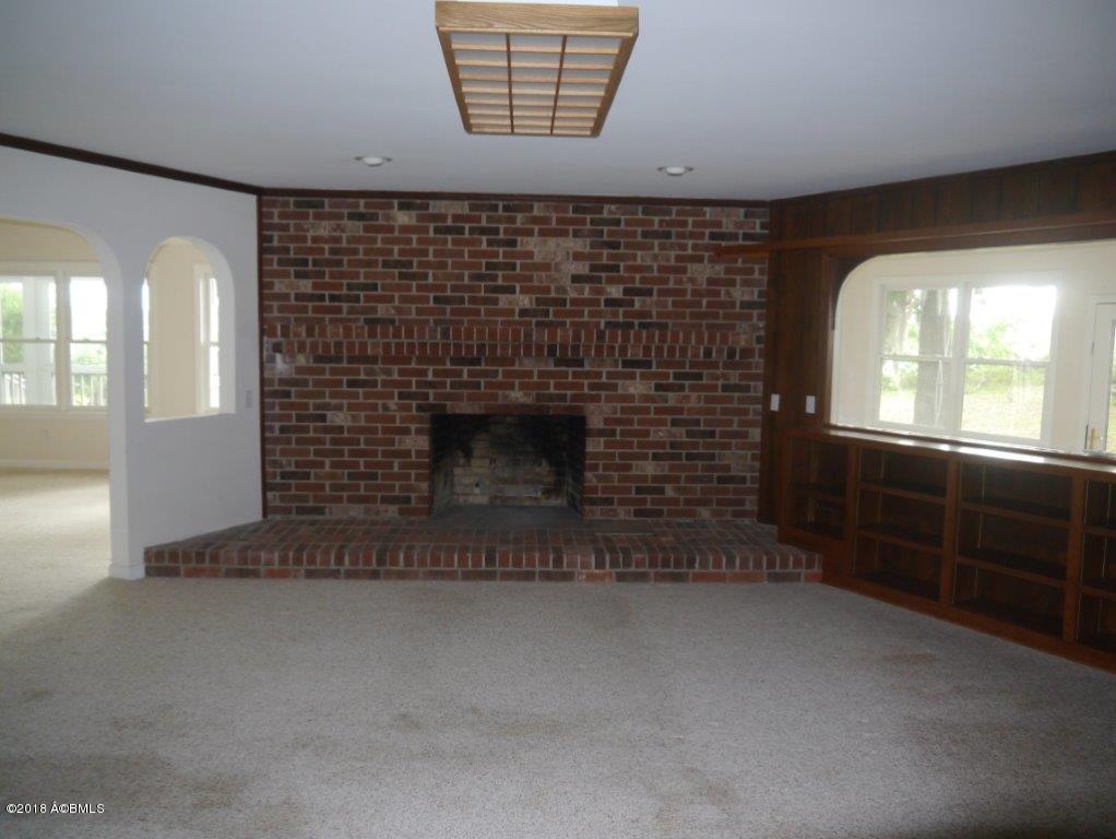 7609 Patterson Road Beaufort, SC 29906 - Photo 9 of 34 LIBRARY FIREPLACE