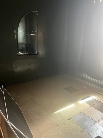 an empty room with windows