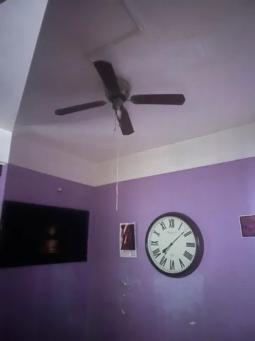 a view of empty room with floor to ceiling window