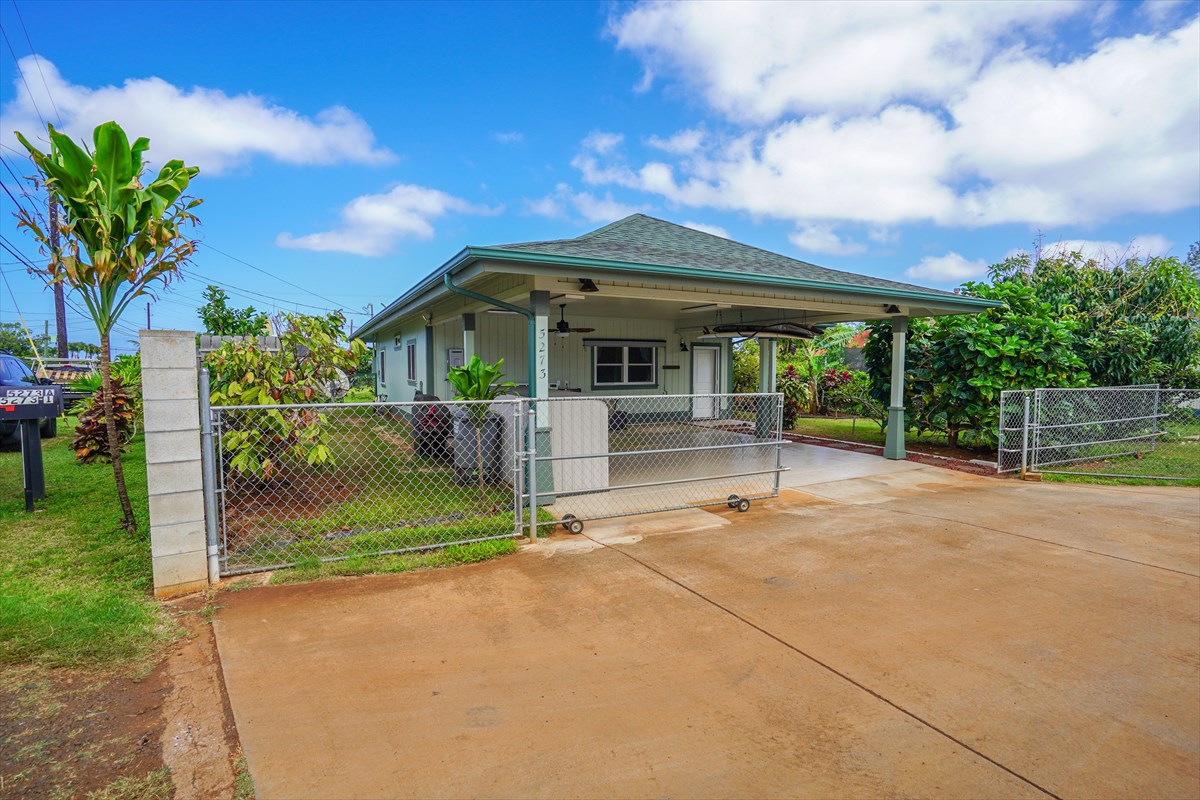 5273 Kawaihau Road, Unit 1 Kapaa, HI 96746 - Photo 16 of 16 a house view with a garden space