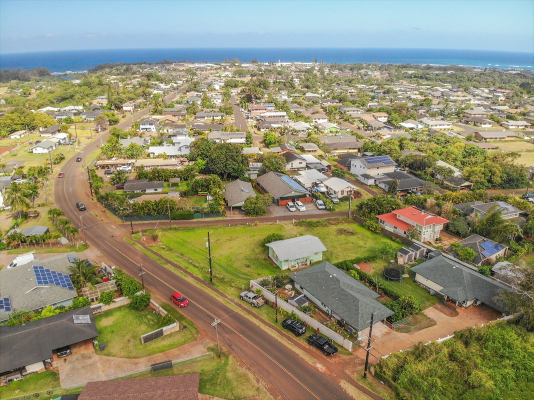 5273 Kawaihau Road, Unit 1 Kapaa, HI 96746 - Photo 3 of 16 an aerial view of residential houses with outdoor space