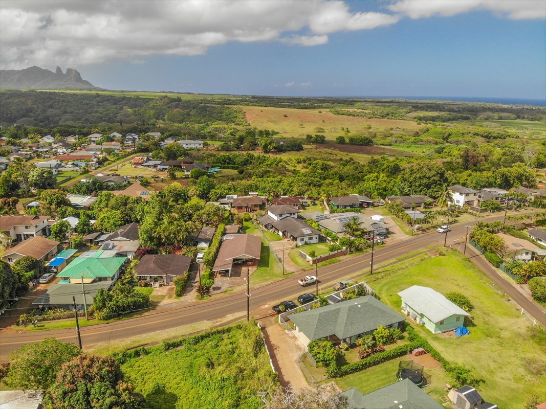 5273 Kawaihau Road, Unit 1 Kapaa, HI 96746 - Photo 4 of 16 an aerial view of residential houses with outdoor space