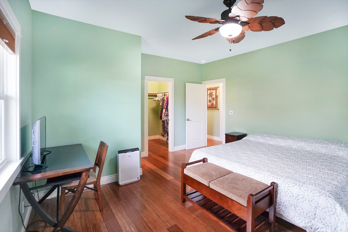5273 Kawaihau Road, Unit 1 Kapaa, HI 96746 - Photo 7 of 16 a living room with furniture and a wooden floor