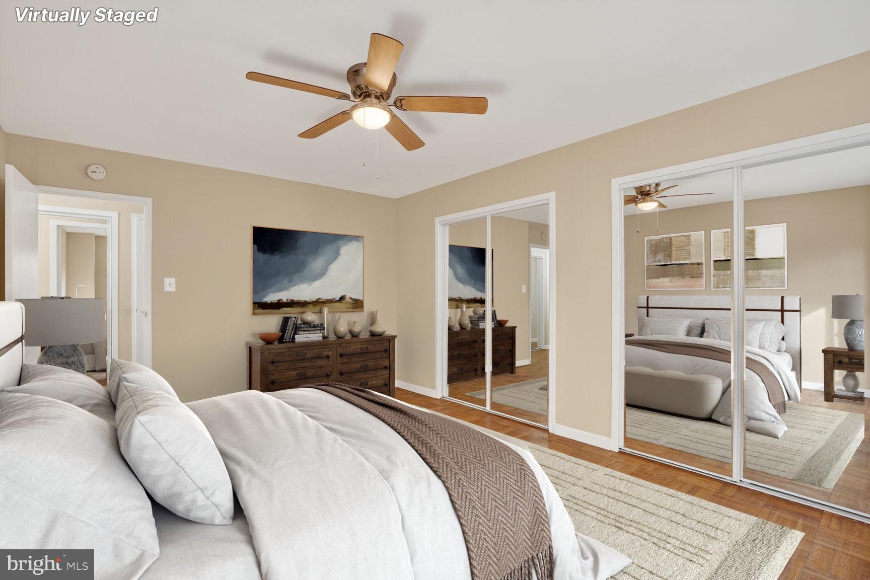 3900 Tunlaw Road Northwest, Unit 103 Washington, DC 20007 - Photo 12 of 41 a bedroom with a bed and a flat screen tv