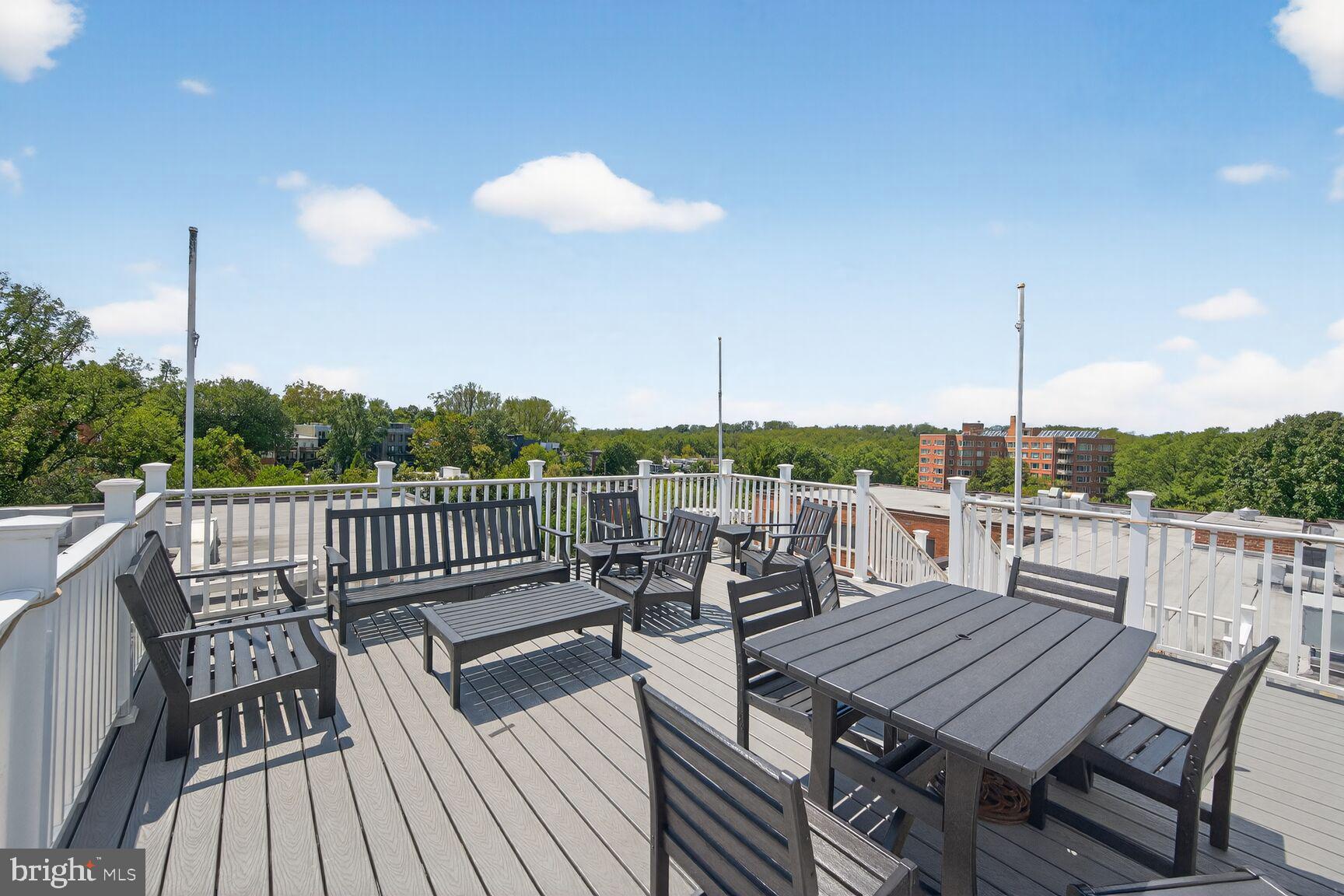 3900 Tunlaw Road Northwest, Unit 103 Washington, DC 20007 - Photo 23 of 41 a view of deck with patio
