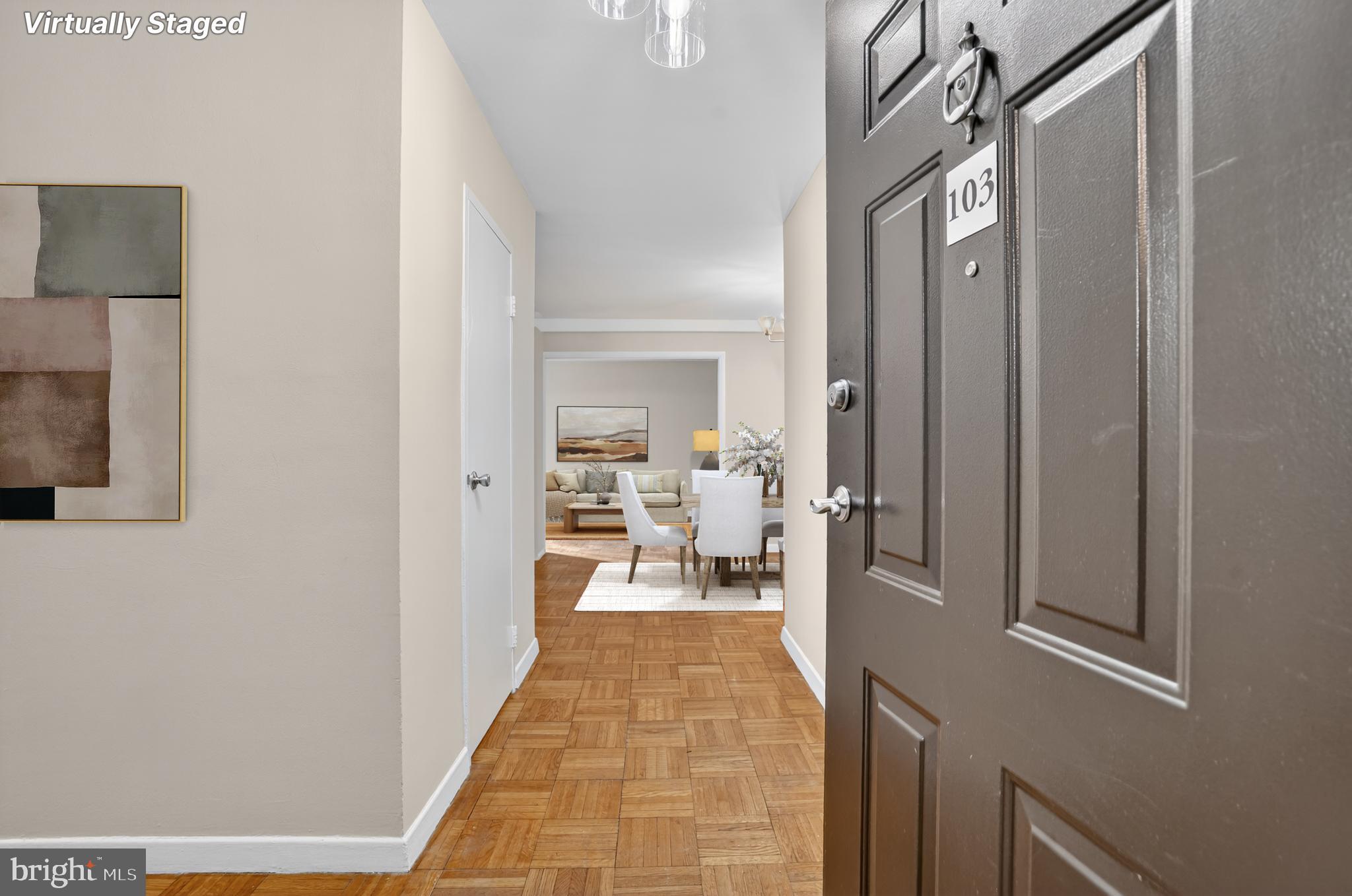 3900 Tunlaw Road Northwest, Unit 103 Washington, DC 20007 - Photo 3 of 41 a en suite bathroom with a sink and a mirror
