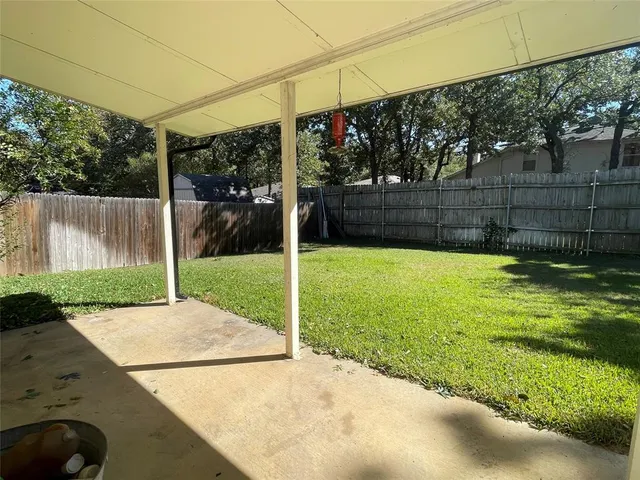 a view of a backyard with a garden