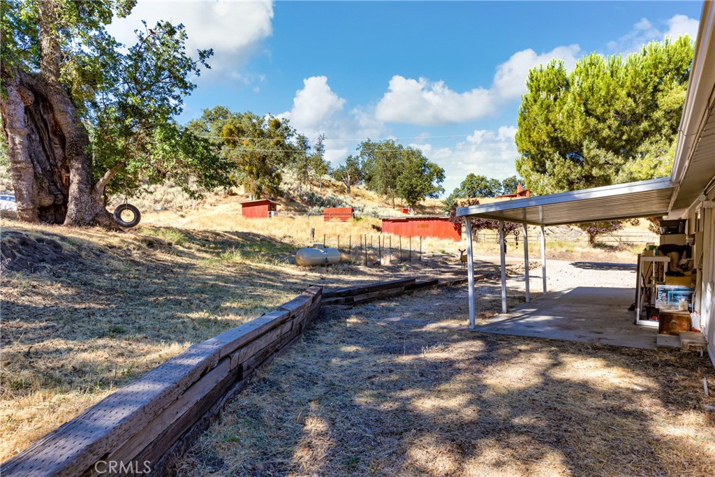 17500 High Gun Drive Tehachapi, CA 93561 - Photo 12 of 46 a view of a backyard with sitting area