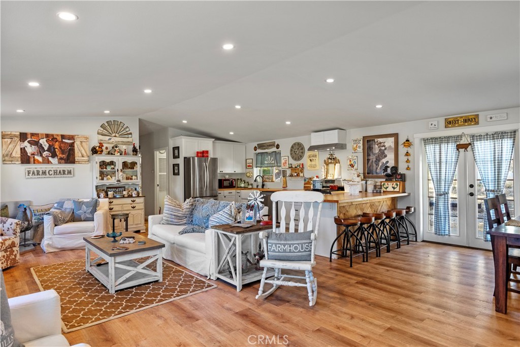 17500 High Gun Drive Tehachapi, CA 93561 - Photo 20 of 46 a living room with furniture and wooden floor