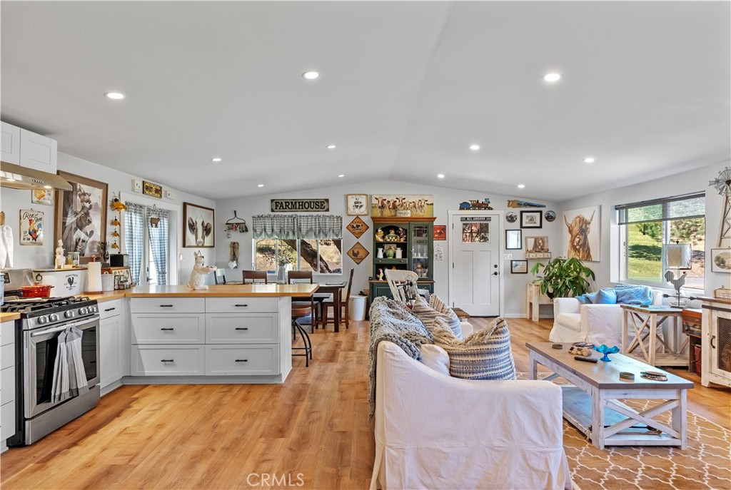 17500 High Gun Drive Tehachapi, CA 93561 - Photo 26 of 46 a living room with lots of furniture and appliances
