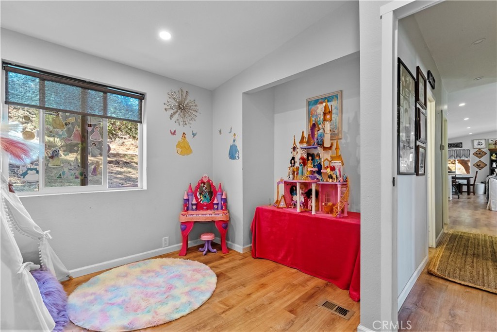 17500 High Gun Drive Tehachapi, CA 93561 - Photo 40 of 46 a view of a hallway with workspace and a window
