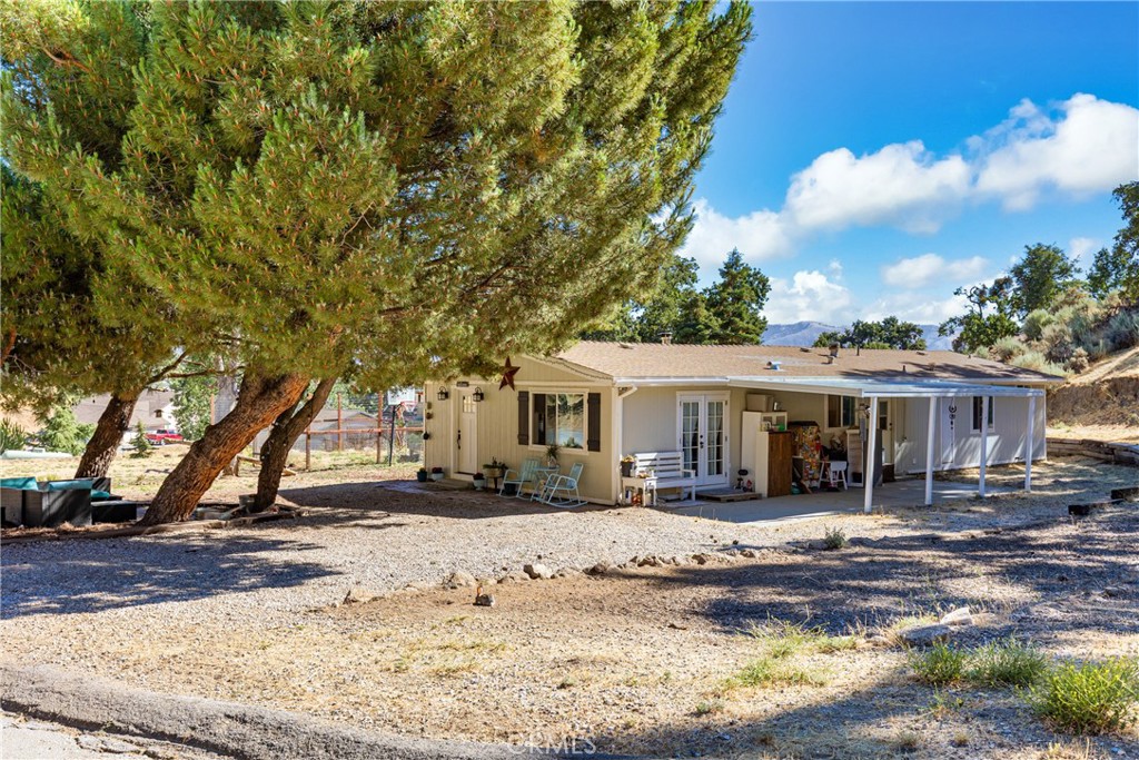 17500 High Gun Drive Tehachapi, CA 93561 - Photo 45 of 46 a front view of a house with a yard