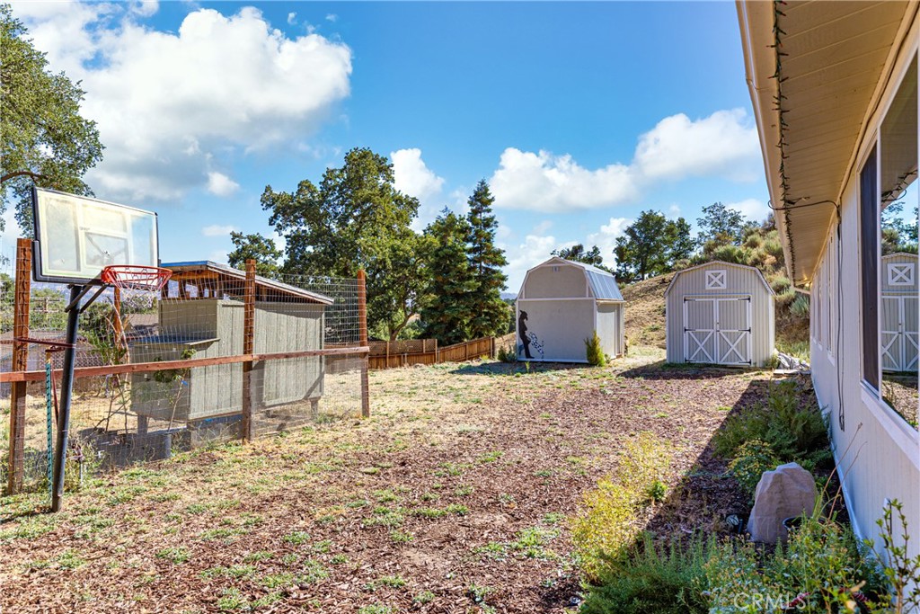 17500 High Gun Drive Tehachapi, CA 93561 - Photo 5 of 46 a view of a chairs and table in the backyard