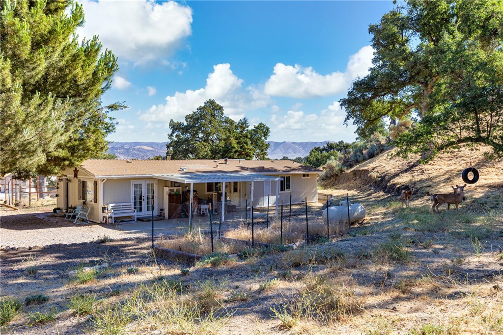 17500 High Gun Drive Tehachapi, CA 93561 - Photo 6 of 46 a view of a house with a yard