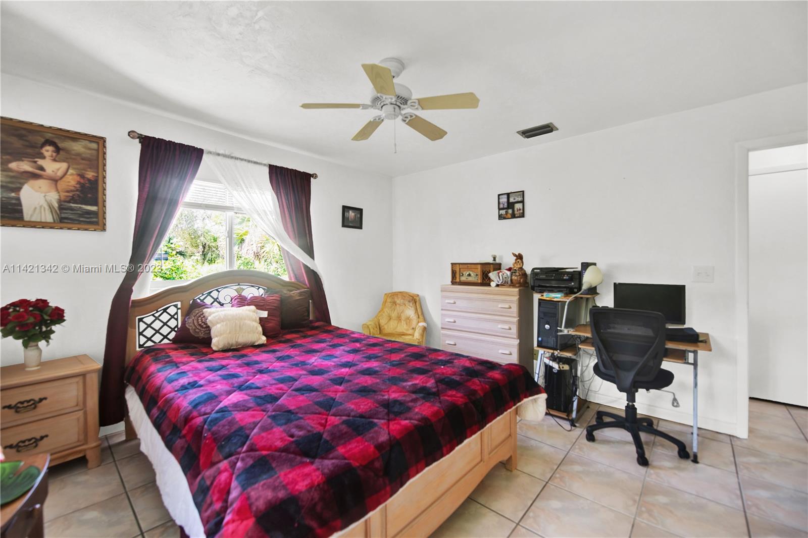 1480 Southwest 17th Street Naples, FL 34117 - Photo 16 of 36 a bedroom with two beds and a window