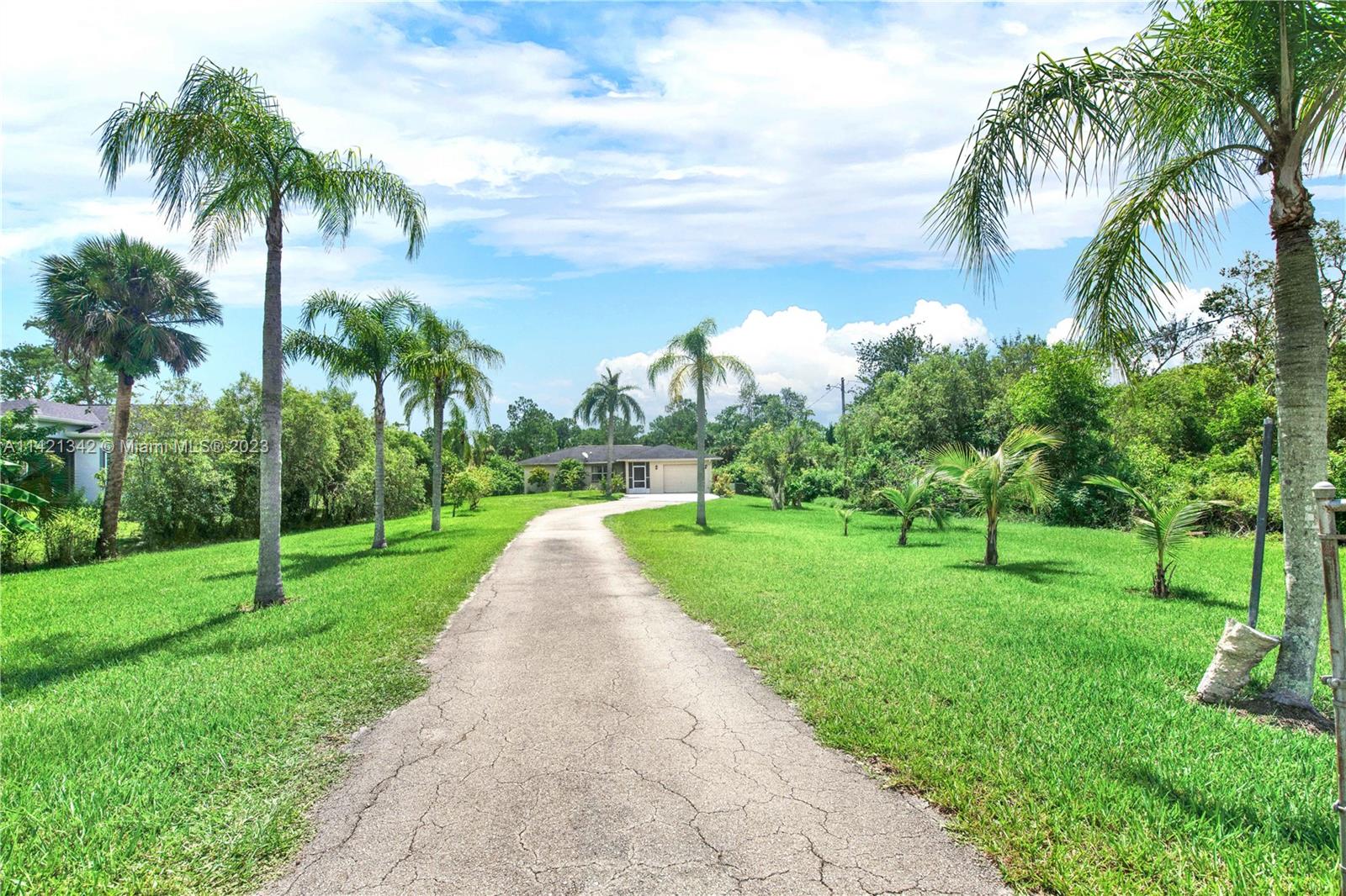 1480 Southwest 17th Street Naples, FL 34117 - Photo 3 of 36 a view of a park with palm trees