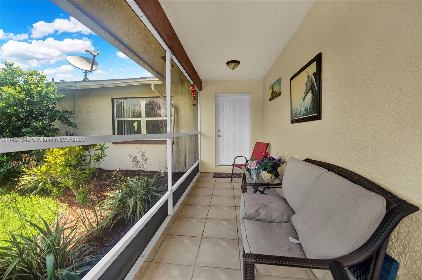 1480 Southwest 17th Street Naples, FL 34117 - Photo 4 of 36 a living room with furniture